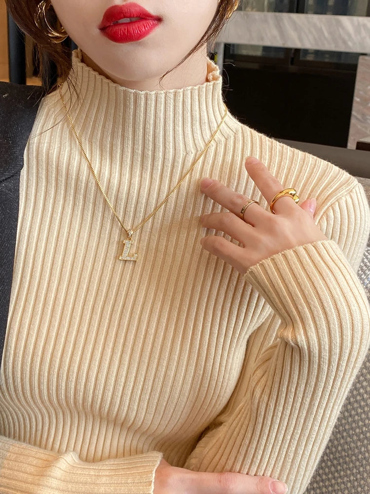Women's basic elegant solid knit sweater with round neck and long sleeves