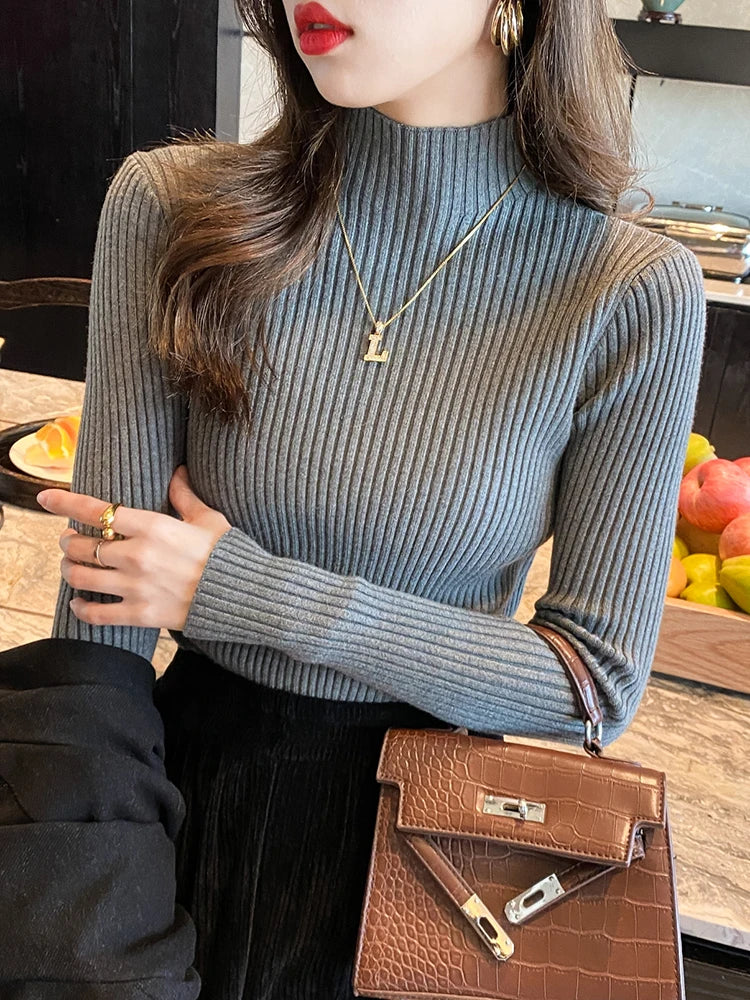 Women's basic elegant solid knit sweater with round neck and long sleeves